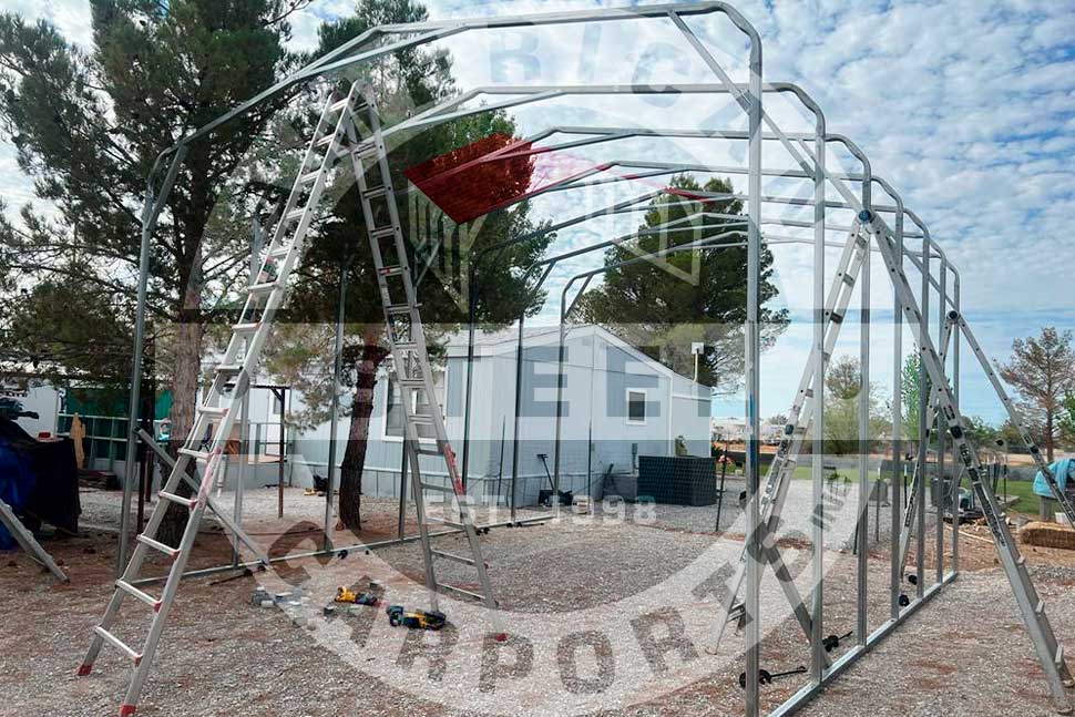A metal carport structure with a ladder, illustrating preparation for hurricane season in the Southeast.